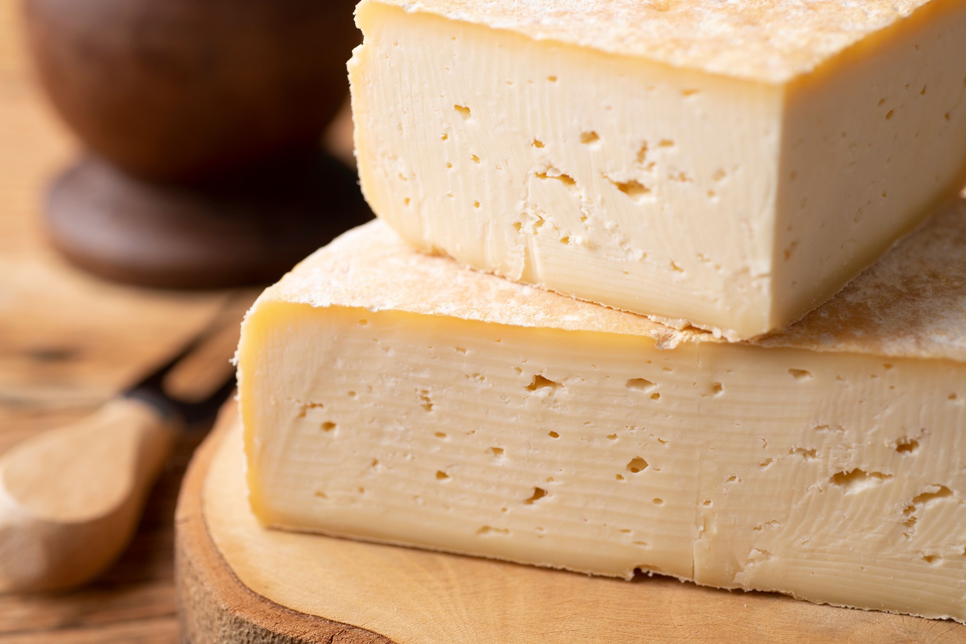 Artisanal Canastra cheese from Minas Gerais, Brazil over wooden board